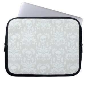 Skullflamskyddsmask i klassisk vit på vitt laptop fodral