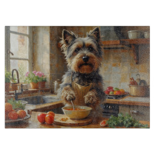 Skye Terrier som lagar mat i köket