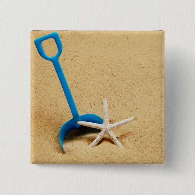Skyffel- & sjöstjärnastrandroligt knapp (Framsida)