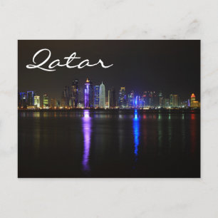 Skyline från Doha, Qatar på vykort för natttext