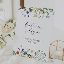 Skylt med vildblomsterfält och bin med egen text