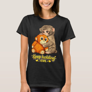 Slå apa med nallebjörn kramande fortsätt hålla t shirt