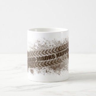 Sladdningen markerar händer kaffemugg