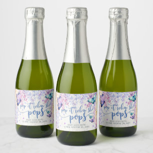Slamfluga när hon poppar minischampagneetikett