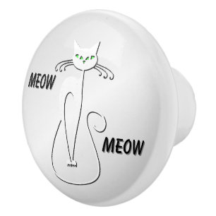 Slinky svart katt Mjaau Mjaau gröna ögon på silver Knopp
