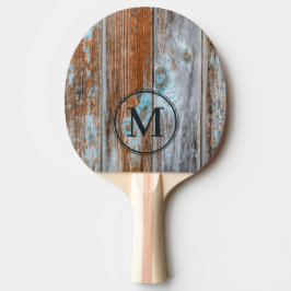 Sliten blå tvätt trä monogram pingisracket
