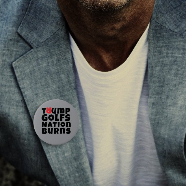 Slogan om antitrumpprotester knapp (Skapare uppladdad)