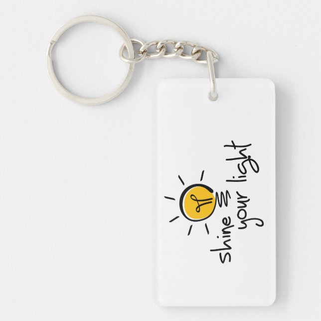 Slogan shine your light. laat je licht schijnen. nyckelring (Framsidan)