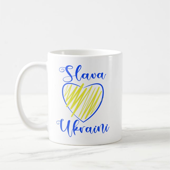 Slogan Slava Ukrainini Glory to Ukraina eart Kaffemugg (Vänster)