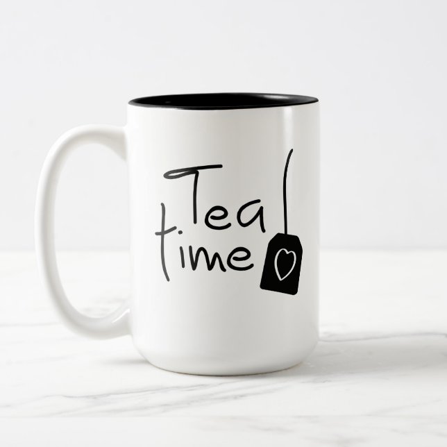 Slogan tea time - theetijd. kopje thee drinken. Två-Tonad mugg (Vänster)