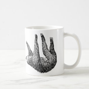 SlothmuggSloth som ut hänger på kanten av Kaffemugg