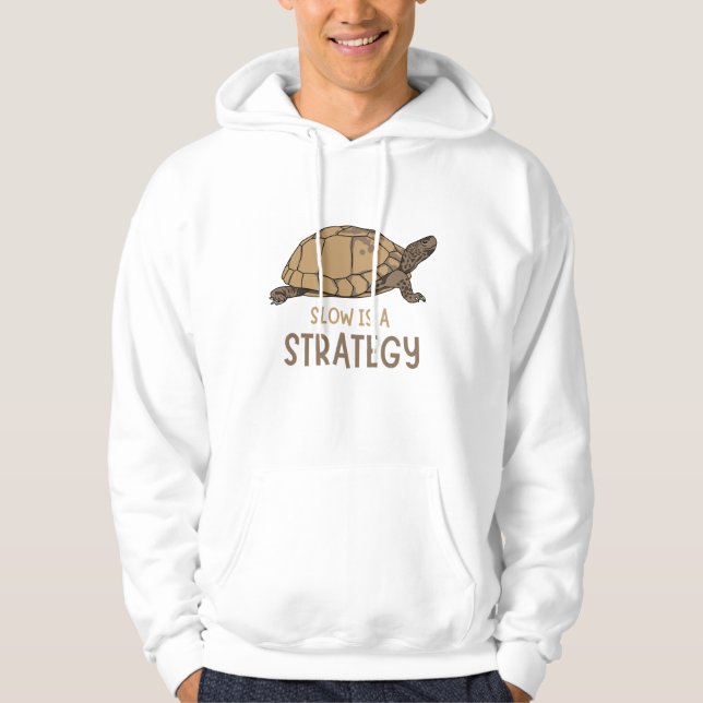 Slow Is a Strategy – Minimal Turtle Quote Design Hoodie (Framsida)