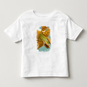 Slut upp av en gul lilja t shirt