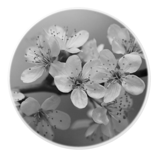 SMÅ BLOMMOR PÅ EN KERAMISK KNAPP KNOPP (Framsidan)