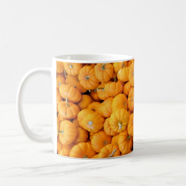 Små orange höstskörd pumpa kaffemugg (Vänster)