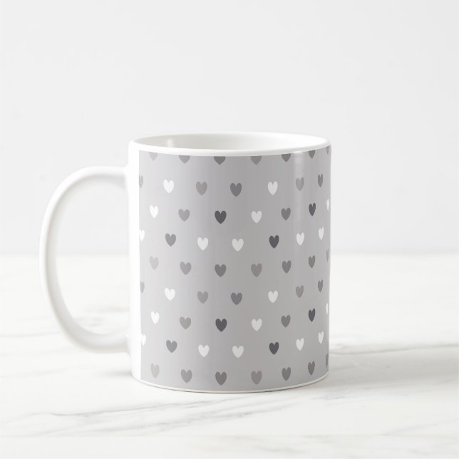 Små polka-hjärtan i gråttets nyans kaffemugg (Vänster)