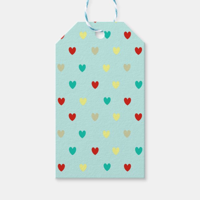 Små polkahjärtan på sjöcellers grönt presentetikett (Framsidan)