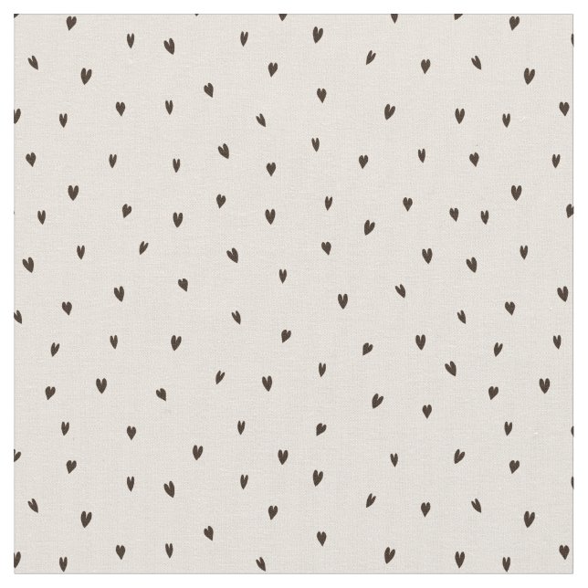 Små, svarta hörn på ljus tyg (Närbild)