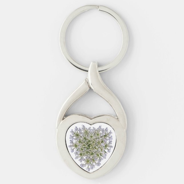 små vita kronblad  twisted heart silverfärgad nyckelring (Framsidan)