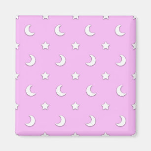 Små vita stjärnor och månar på rosa magnet