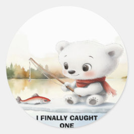 Småbjörnen har slutligen landat en fisk runt klistermärke