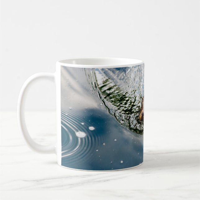 SMALSKT SVAMMANDE KAFFEMUGG (Vänster)