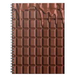 Smält choklad droppar över ett chokladblock anteckningsbok