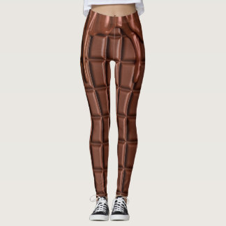Smält choklad droppar över ett chokladblock leggings