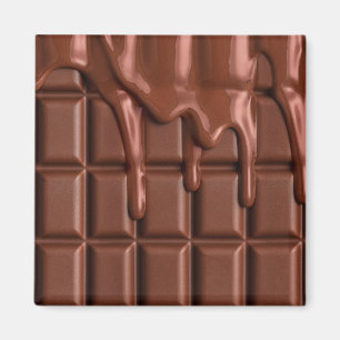 Smält choklad droppar över ett chokladblock magnet