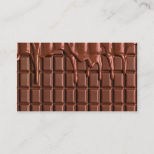 Smält choklad droppar över ett chokladblock visitkort