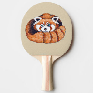 Smårödpandbjörn på tan pingisracket