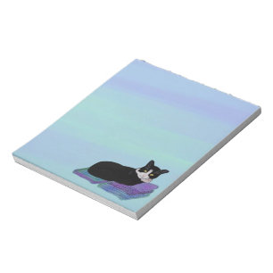 Smokingkatten ta sig en tupplur anteckningsblock