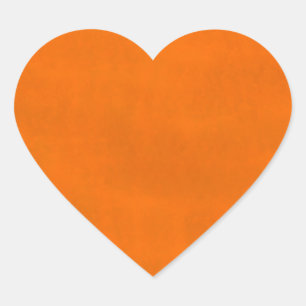 Smutsa ner orangen hjärtformat klistermärke