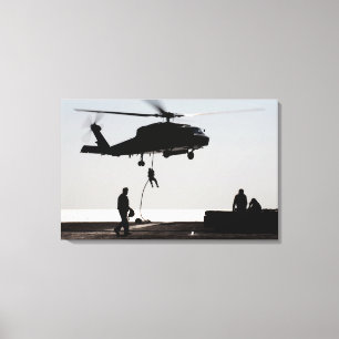 Snabb upplinning av personal från en SH-60F Canvastryck