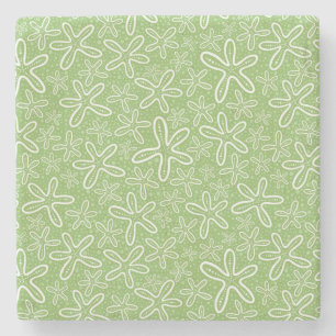 Snäckamönster på prickig bakgrund stenunderlägg