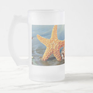Snäckor och svält på strand frostat ölglas