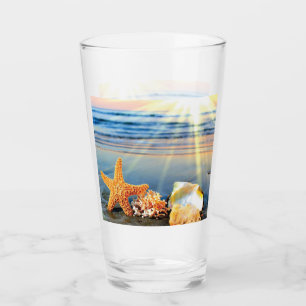 Snäckor och svält på strand glaskopp