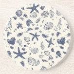 Snäckor & Starfish Sandstone Underlägg - Kustnära<br><div class="desc">För lugnen kusten till bord med denna vackra sandsten som underlägg delikata snäckor och stjärnfisk mot en mjuk,  havsinspirerad bakgrund. Perfekt för strandhus,  sommarvibes eller någon som kärlek marin-temedad décor. Absorberande,  hållbar och naturlig elegant - en underbar gåva eller ett hemtillskott.</div>