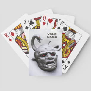 Snake ovanför huvudskulptur casinokort