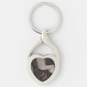 SNAKE SKIN TWISTED HEART SILVERFÄRGAD NYCKELRING
