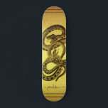 Snakes Personlig Faux Gold Foil Skateboard<br><div class="desc">En unik skateboard med två ormar insnärjda och din namngivna personlig i ett skript namnteckning på en faux guld-folie. öga fångar och fet.</div>