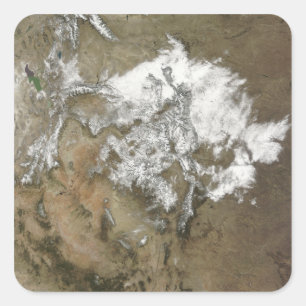 Snö omfattar Rocky mountains i Förenta staterna Fyrkantigt Klistermärke