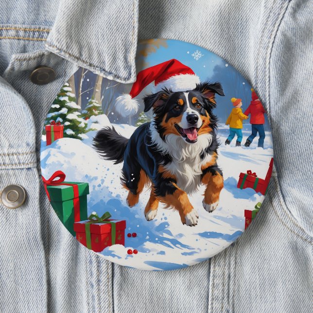 Snö-scenen i australian shepherd vid julfesten knapp (In Situ)