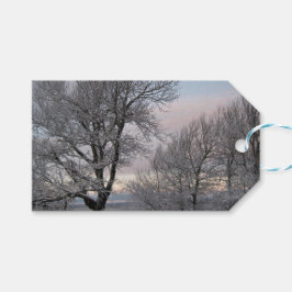 Snö täckte grenar presentetikett