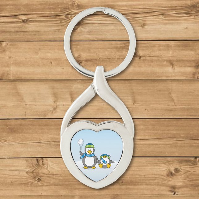 Snöballerande penguiner twisted heart silverfärgad nyckelring (Skapare uppladdad)