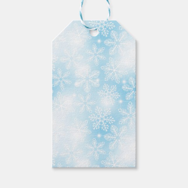 Snöflingor och ljus om blått presentetikett (Framsidan)