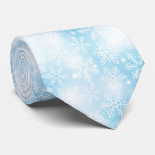 Snöflingor och ljus om blått slips