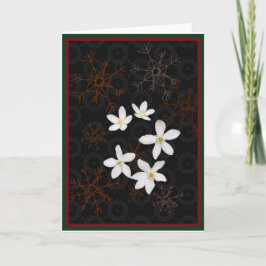Snöflingor och vita julblommor helgkort