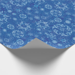Snöflingor på blått presentpapper