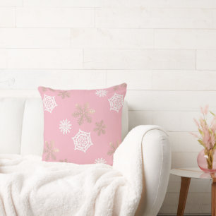 snöflingor på blekens rosa kudde